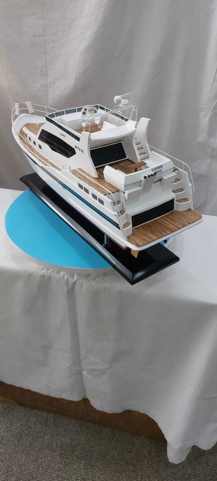 Handcrafted Gamine motor boat model with detailed cabin and sleek hull