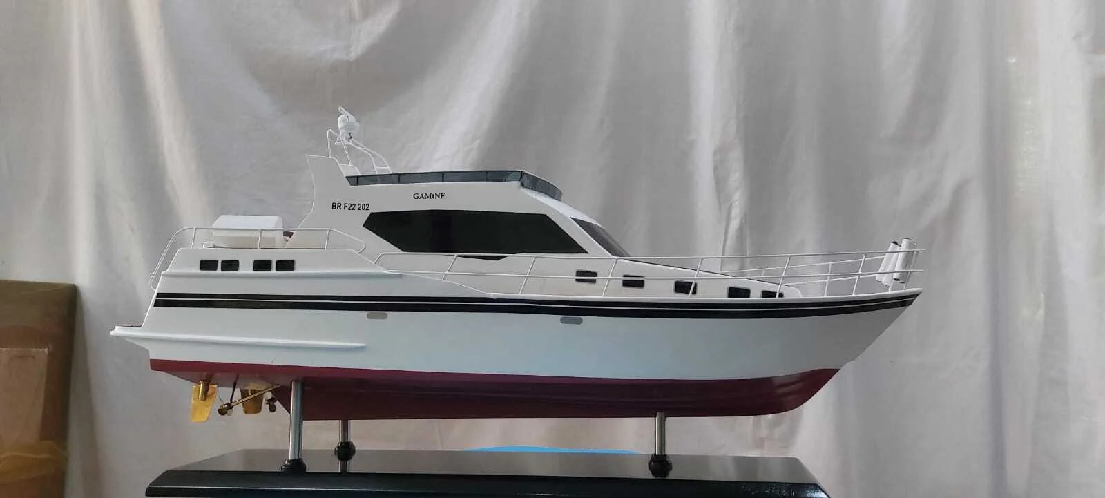 Handcrafted Gamine motor boat model with detailed cabin and sleek hull