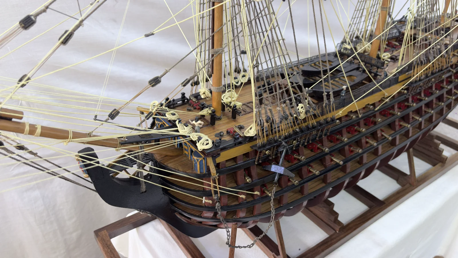 Large handcrafted 1m 35cm wooden HMS Victory ship model with cutaway hull revealing interior decks