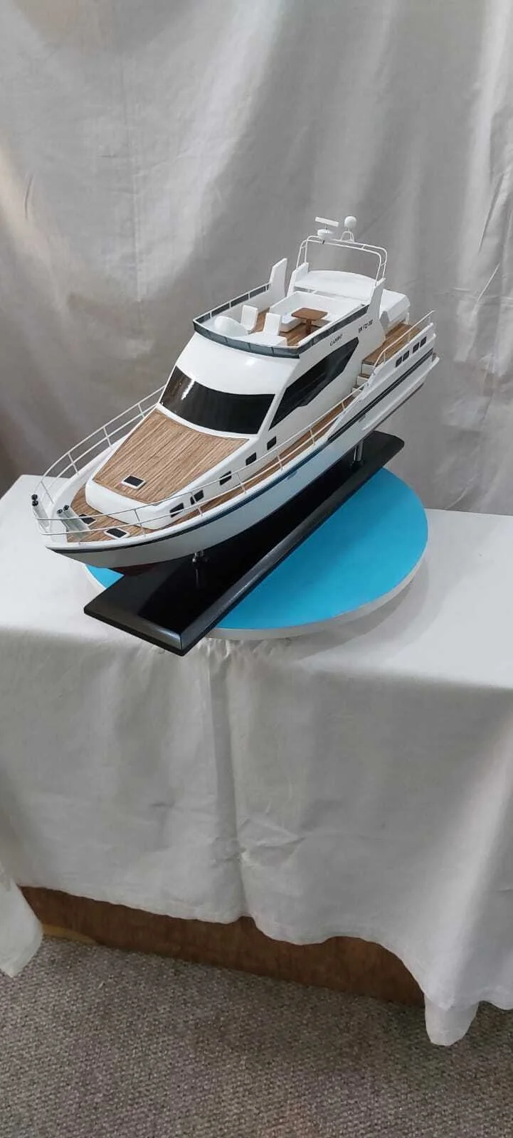 Handcrafted Gamine motor boat model with detailed cabin and sleek hull