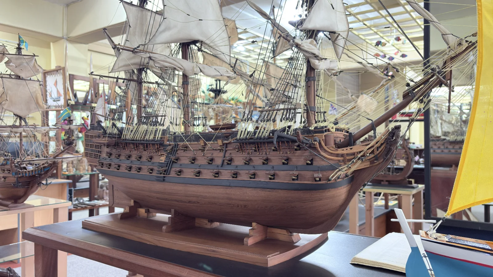 Large handcrafted 1m 50cm rosewood HMS Victory ship model replica with detailed rigging and sails