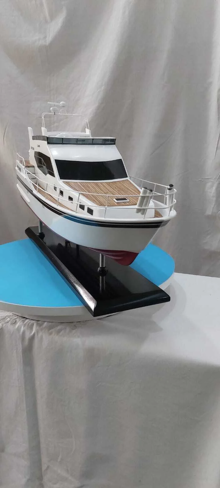 Handcrafted Gamine motor boat model with detailed cabin and sleek hull