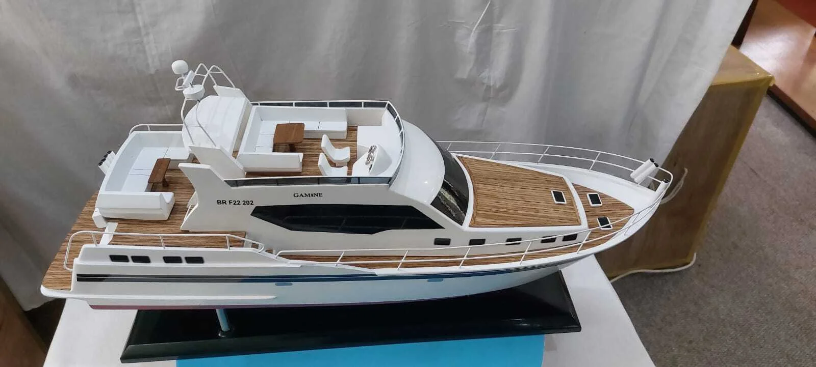Handcrafted Gamine motor boat model with detailed cabin and sleek hull