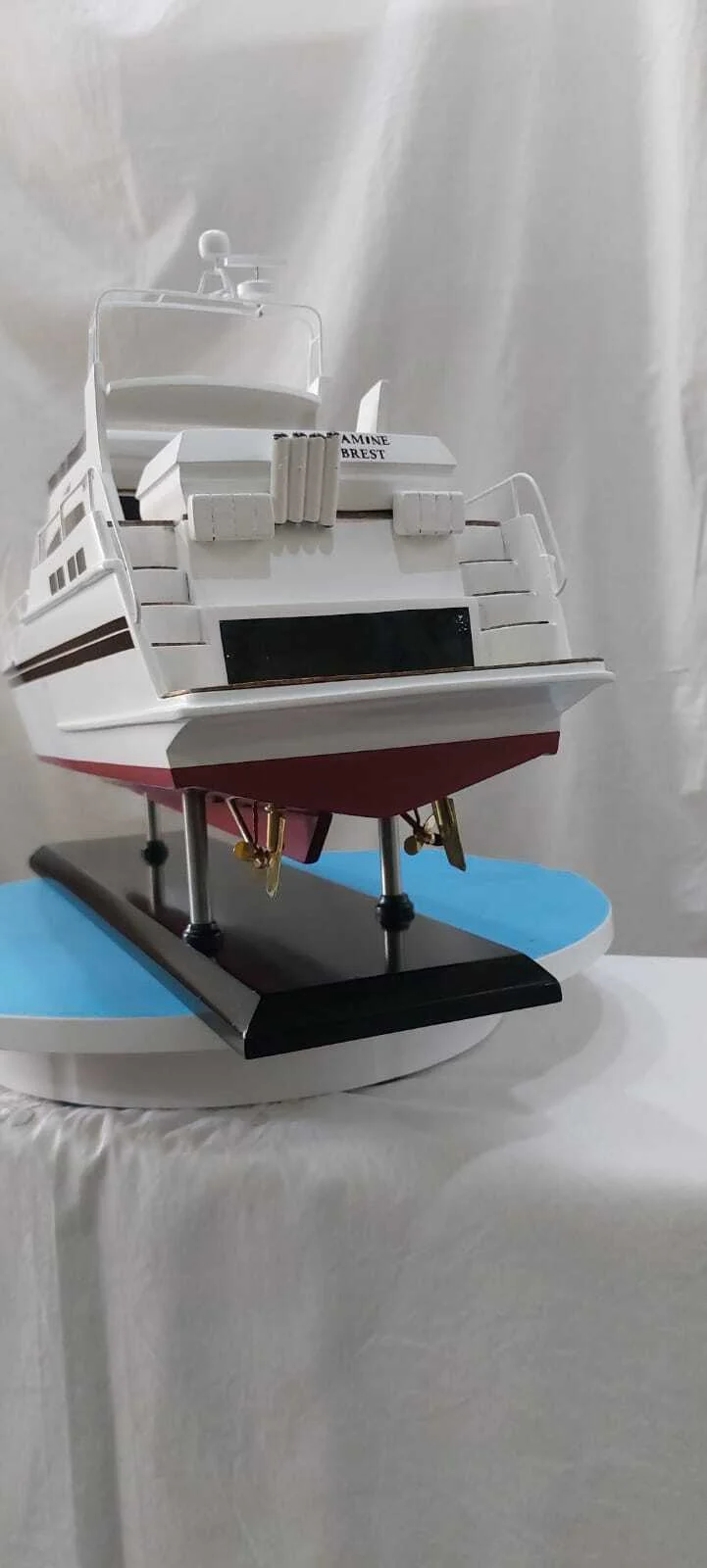 Handcrafted Gamine motor boat model with detailed cabin and sleek hull