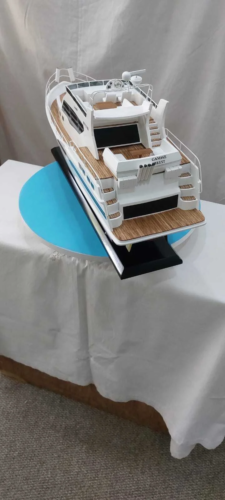 Handcrafted Gamine motor boat model with detailed cabin and sleek hull