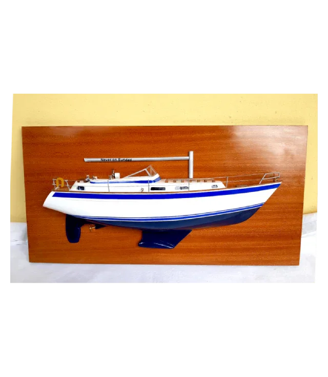 Handcrafted premium wooden scale model of the Scandinavian Hallberg-Rassy 36 Mk II sailing yacht on a luxury stand.