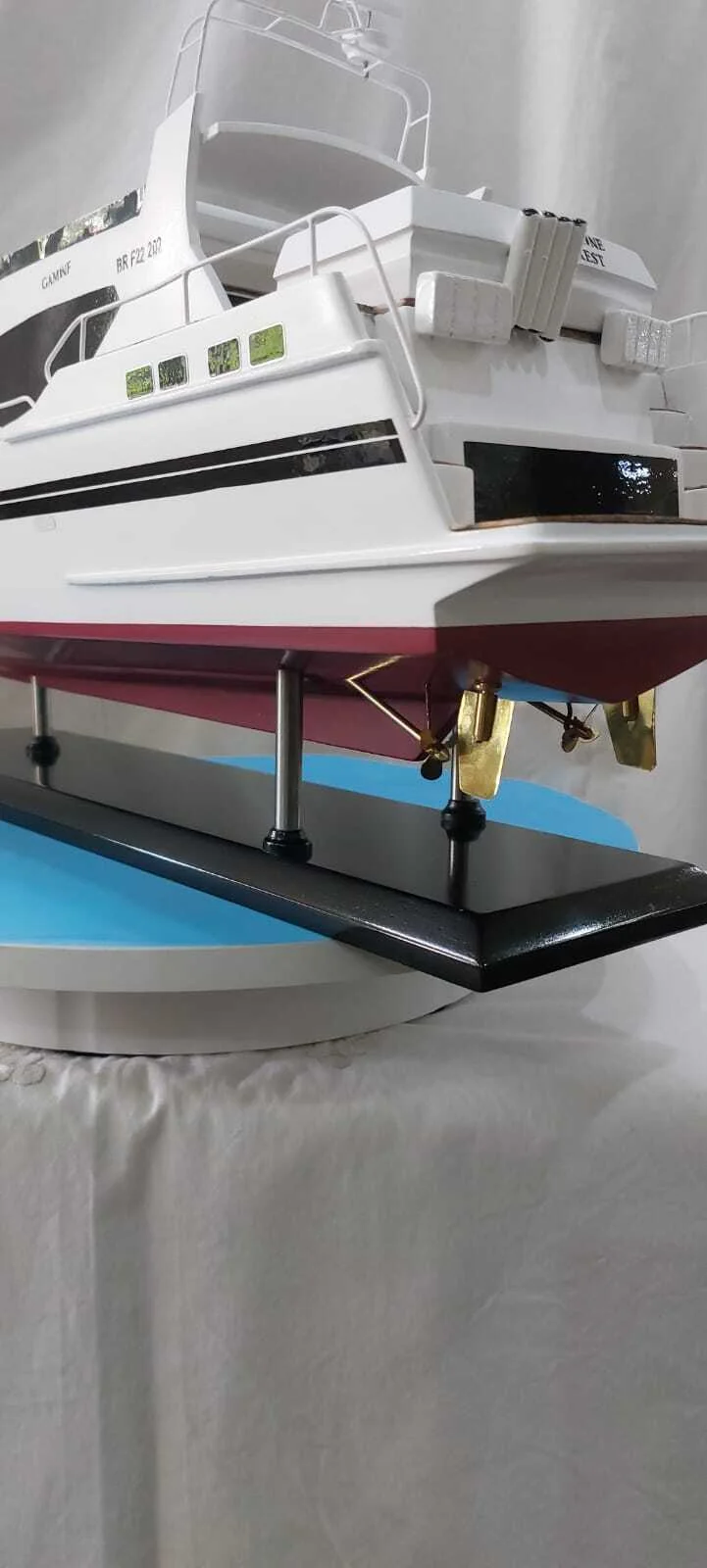 Handcrafted Gamine motor boat model with detailed cabin and sleek hull